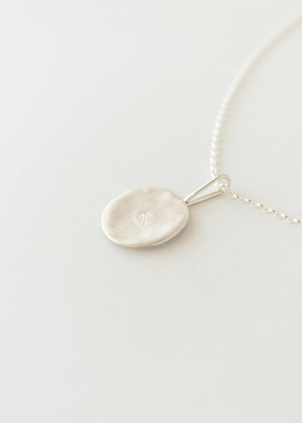 Mini silver moon necklace