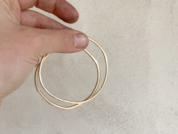 Uneven bangle gold